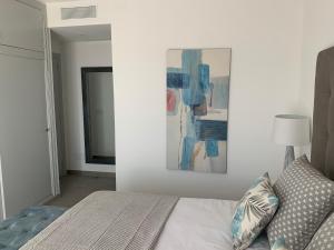 Postel nebo postele na pokoji v ubytování Apartamento en Playa Santo Tomas