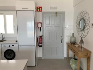 Kuchyň nebo kuchyňský kout v ubytování Apartamento en Playa Santo Tomas