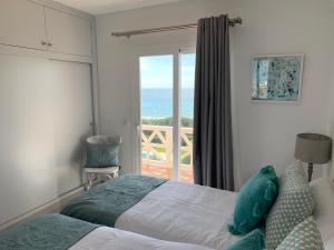 Postel nebo postele na pokoji v ubytování Apartamento en Playa Santo Tomas