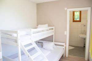 Postel nebo postele na pokoji v ubytování Klamberghof Burgstaller