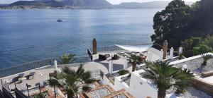 arial view of a house with a view of the water at Castello Apartment in Bacoli