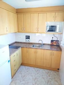 Kuchyň nebo kuchyňský kout v ubytování Kesito Family Apartments