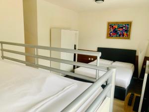 Katil atau katil-katil dalam bilik di Hotel Gamper