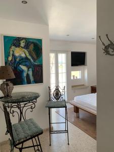 Posteľ alebo postele v izbe v ubytovaní El Chili Boutique Hotel