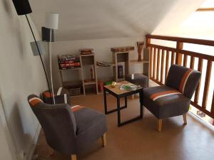 A seating area at Hôtel Le Beauséjour