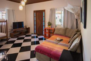 Et tv og/eller underholdning på Pousada Azul com vista maravilhosa