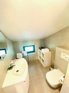 Koupelna v ubytování Apartments Pri nas