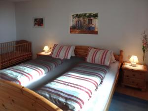 Postel nebo postele na pokoji v ubytování Appartements Sam + 31 fotografií