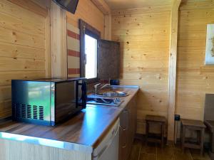 Kuchyň nebo kuchyňský kout v ubytování Alojamiento Rural Setenil
