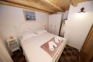 Postel nebo postele na pokoji v ubytování Robinson house''La Vida''