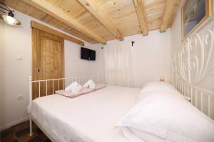 Postel nebo postele na pokoji v ubytování Robinson house''La Vida''