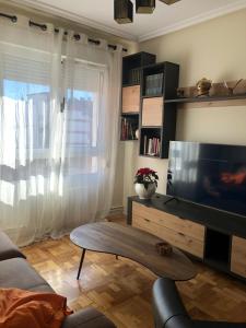 A television and/or entertainment centre at Casa en la playa