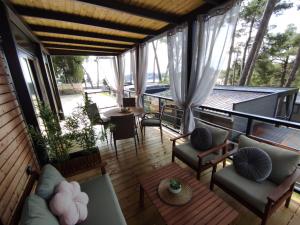 Posedenie v ubytovaní Mobile Home Leggiero 156 - Porton Nature Hideouts