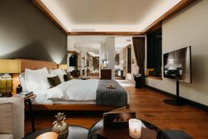 Postel nebo postele na pokoji v ubytování DO & CO Hotel München