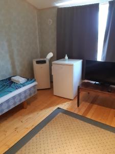 Postel nebo postele na pokoji v ubytování meijeriranta majoitus