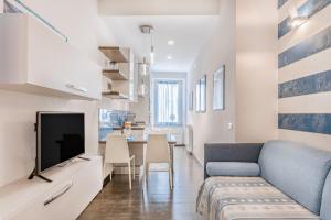 TV a/nebo společenská místnost v ubytování Blu Mare Apartment
