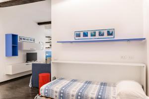 Postel nebo postele na pokoji v ubytování Blu Mare Apartment