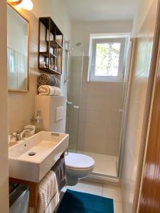 Koupelna v ubytování Landhaus Klopein + 37 fotografií