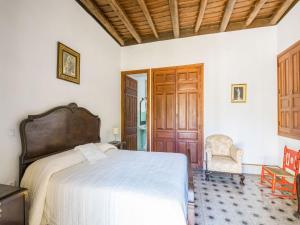 Łóżko lub łóżka w pokoju w obiekcie Holiday Home in Aracena with Private Pool
