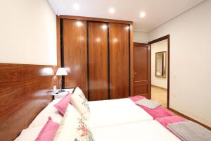 Postel nebo postele na pokoji v ubytování Apartamento Oviedo General Elorza