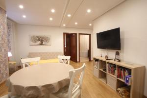 TV a/nebo společenská místnost v ubytování Apartamento Oviedo General Elorza