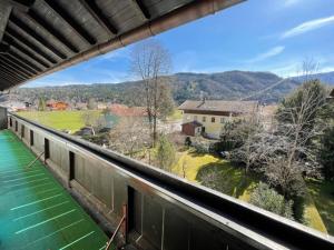 a view of a river from a balcony of a house at Alpenauszeit in (den) Bergen in Bergen