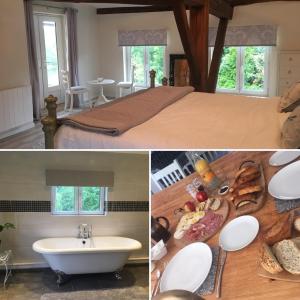 a bedroom with a bed and a sink and a tub at Chez Broche in Mazerolles