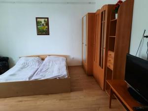 Posteľ alebo postele v izbe v ubytovaní Linda Vendégház