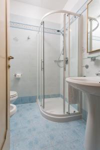 a bathroom with a shower and a sink at Locanda Cà Le Vele in Venice +66 photos