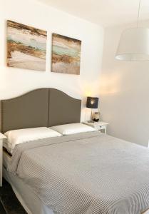 Postel nebo postele na pokoji v ubytování La Polena Camere Vernazza - Carattino Apartment