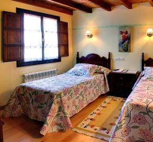 Postel nebo postele na pokoji v ubytování Hotel L´Alloru + 26 fotografií
