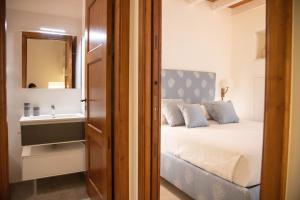 En eller flere senge i et værelse på La terrazza di Chiara - vista mare