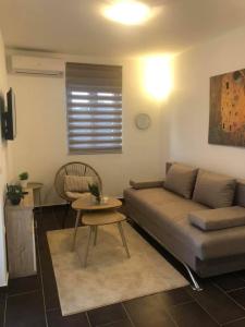 Гостиная зона в Apartments Sestanka