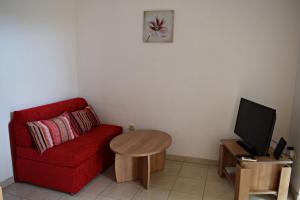 TV a/nebo společenská místnost v ubytování Apartmani Barišić