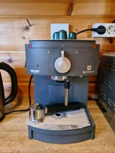 Coffee and tea making facilities at Charmantes Ferienhaus am Waldrand