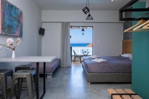 Postel nebo postele na pokoji v ubytování Nireas Hotel + 37 fotografií
