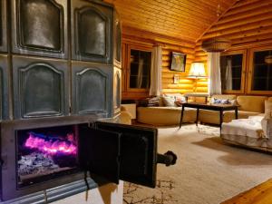 A seating area at Charmantes Ferienhaus am Waldrand