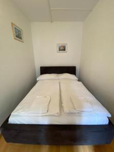 Postel nebo postele na pokoji v ubytování Suite Hotel 200m zum Prater