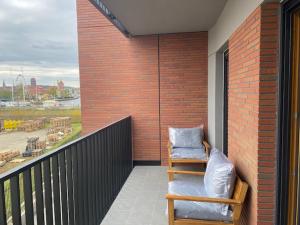 Balkón alebo terasa v ubytovaní APARTAMENT NAD MOTŁAWĄ Z WIDOKIEM