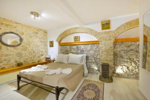 A bed or beds in a room at Studio in Corfu town