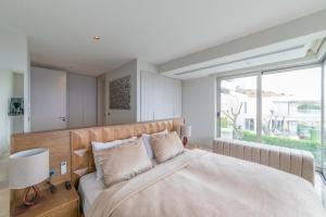 A bed or beds in a room at The View Bodrum