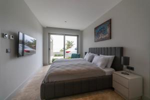 A bed or beds in a room at The View Bodrum Még 37 kép