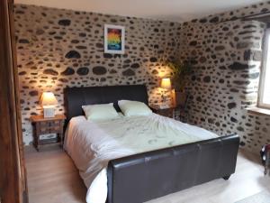 Ένα ή περισσότερα κρεβάτια σε δωμάτιο στο Maison Mignaquy +33 φωτογραφίες