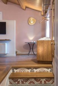 a living room with a table and a table sidx sidx sidx at Dimora del Leone Gaeta in Gaeta