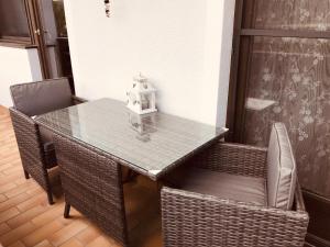 Posedenie v ubytovaní Ferienwohnung Resi mit traumhaftem Seepanorama