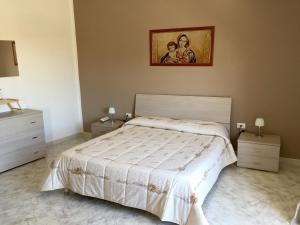 Giường trong phòng chung tại Casa Mia