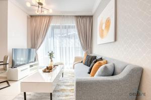 Posezení v ubytování Splendid 1BR in Executive Bay Tower Business Bay by Deluxe Holiday Homes