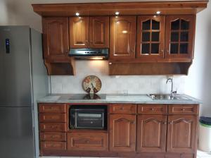 A kitchen or kitchenette at Litus Amoris