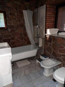 Ένα μπάνιο στο Apartamentos del Cerro +27 φωτογραφίες
