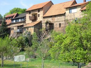 an old brick building with a lot of windows at Gästehaus Susanne Pfaffmann in Landau in der Pfalz